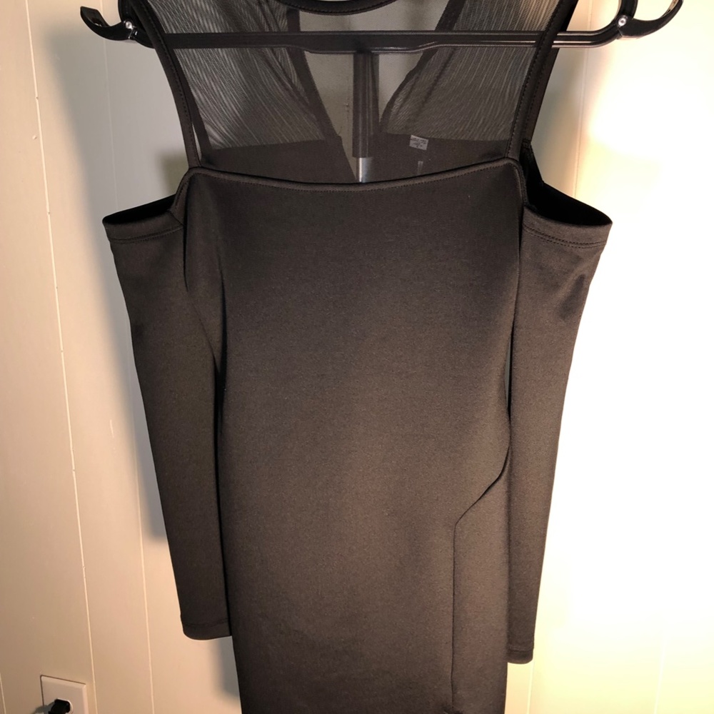 Dress size  4 .Black  YYIGAL. DESIGN LAB.